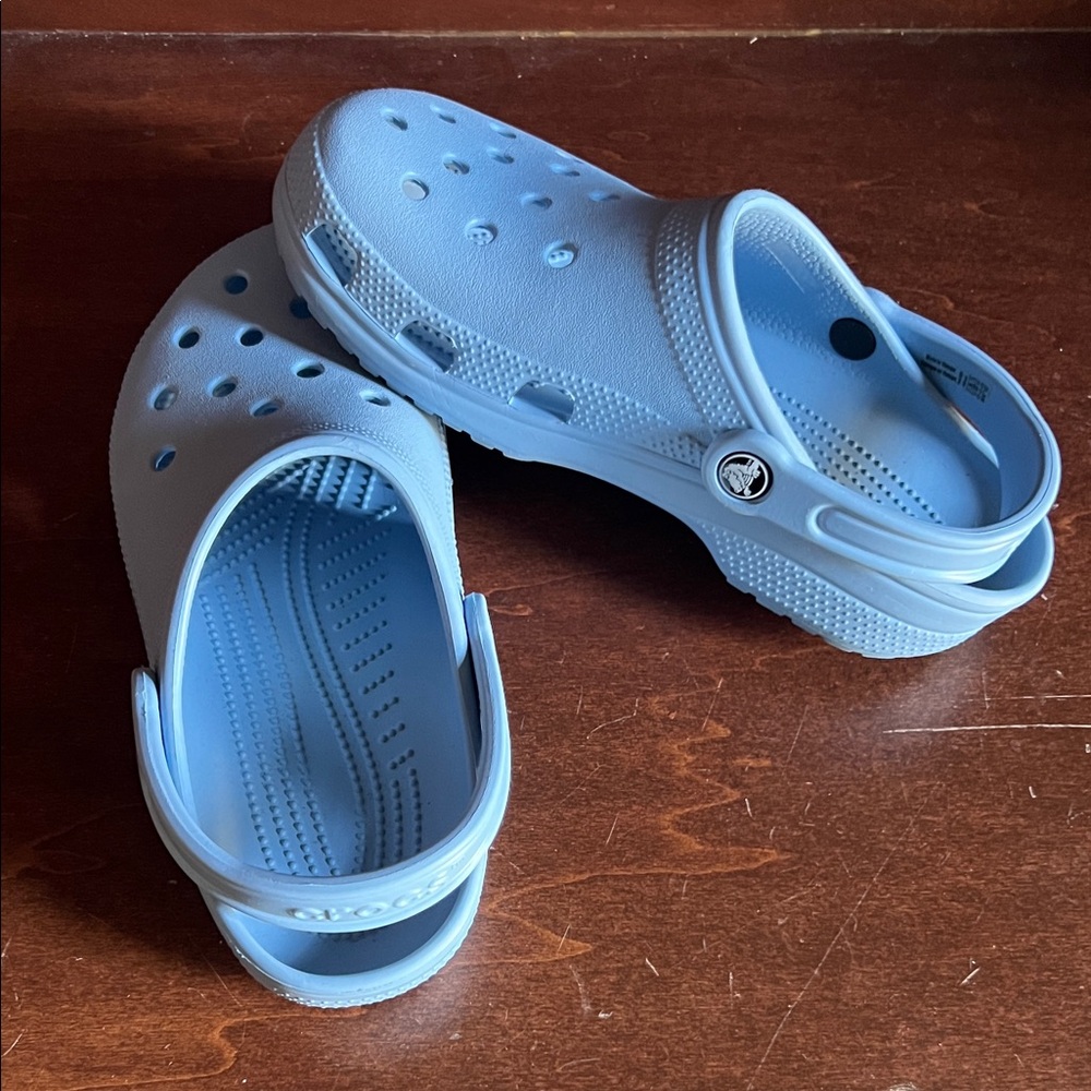 Classic CROCS Light Blue clog with strap, women’s size 8 or men’s size 6